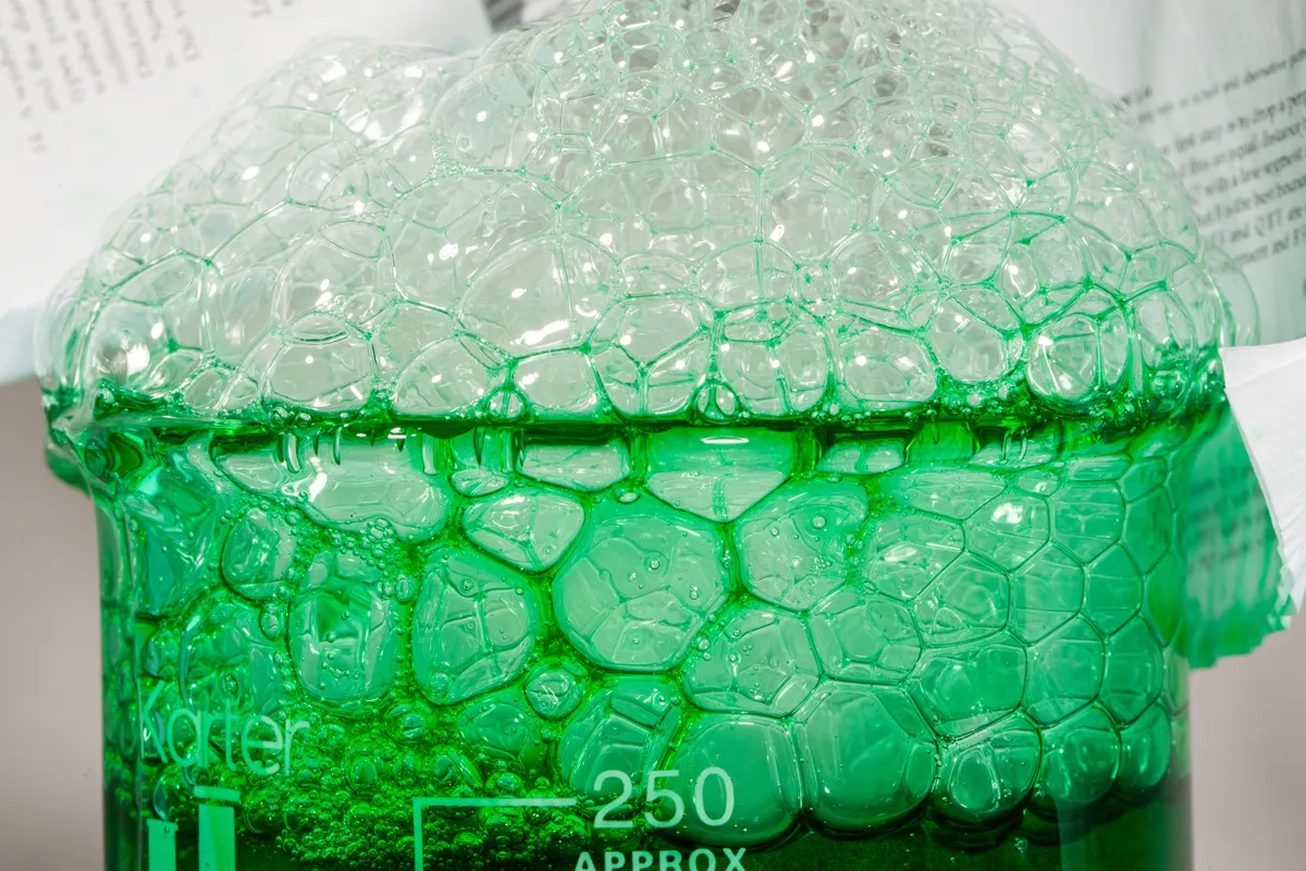 Beaker of slime bubbling over.